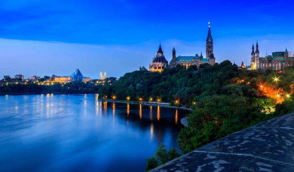 View of parliament buildings on the bank of the Ottawa River