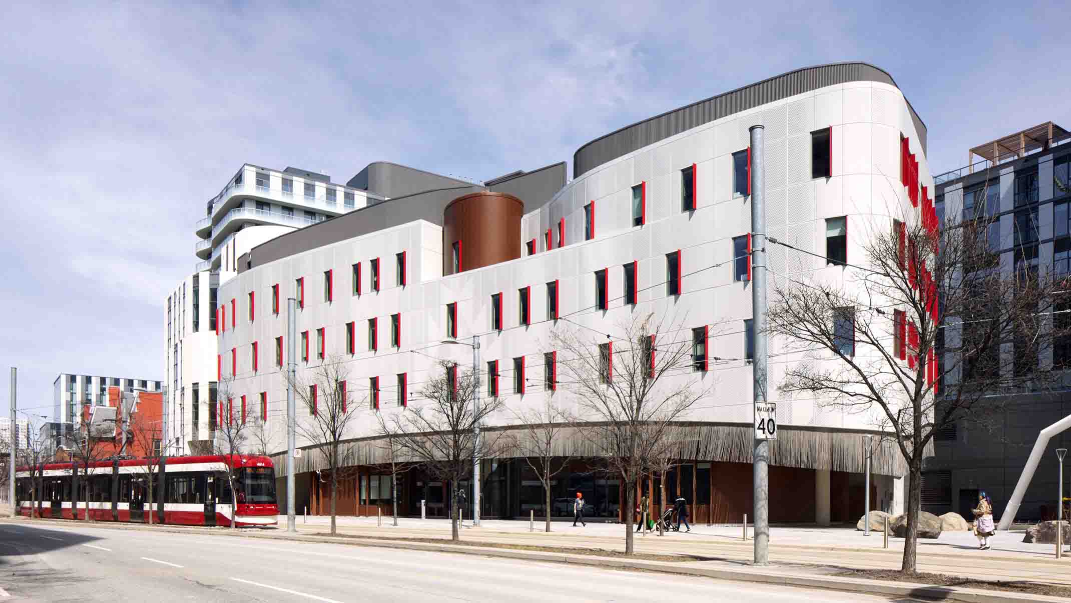 Exterior building and street with transit vehicles