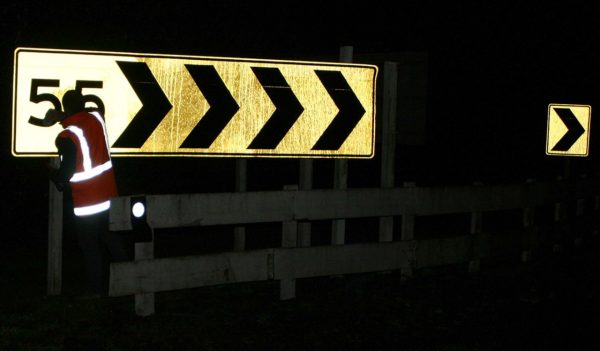 cleaning outdoor road sign