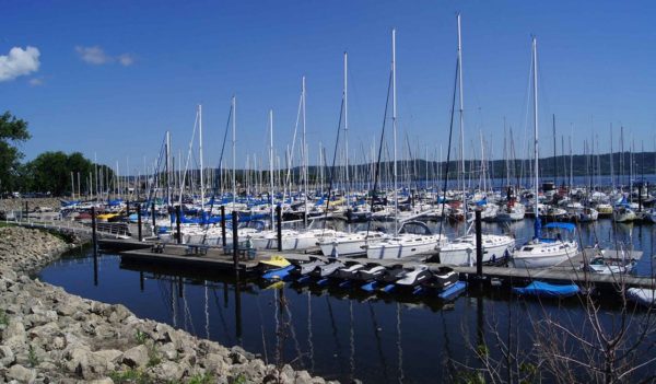 Sailboats parked at Lake Pepin waterfront marina.