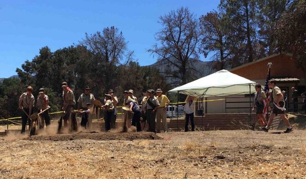 Boy scouts at a ceremony to break ground.