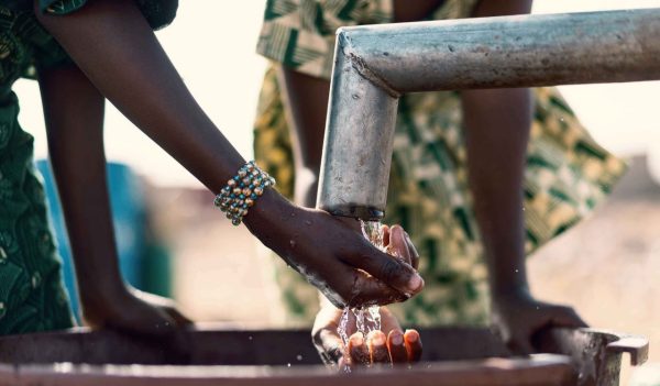 African children collecting healthy water