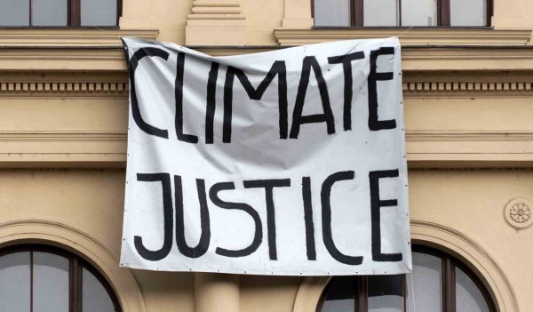 Climate Justice Banner outside building