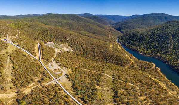 Aerial panorama of Snowy River and Hydro Surge Tower near Mount Kosciuszko National Park, Australia