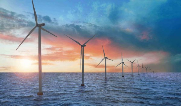 Floating wind turbines installed in sea. 