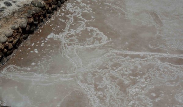 Close-up of the water in a salt mine tailings pond.