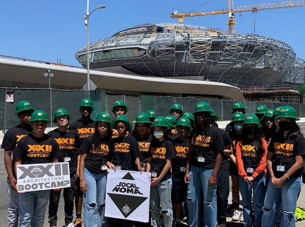 Group image of student participants in the SoCal NOMA Project Pipeline camp touring various locations, including the under-construction Lucas Museum of Narrative Art in Los Angeles.