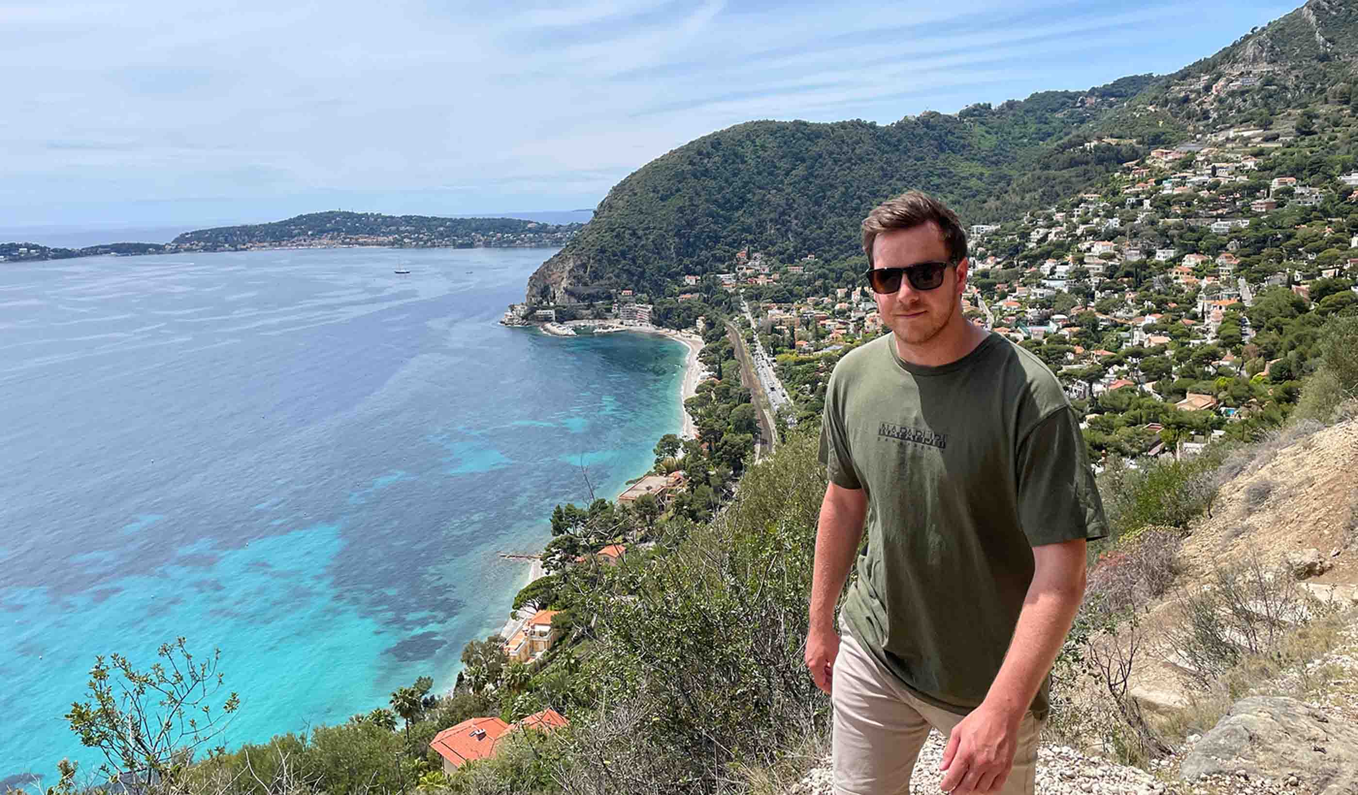 Fred Hartley walking along a coastline