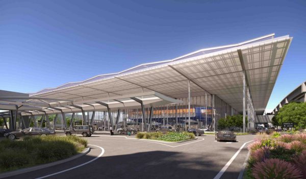 Exterior of ternial entrance with an architectural canopy over the passenger drop off area.