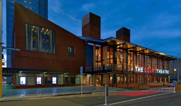 Buildign exterior at night it up  - view from the street.