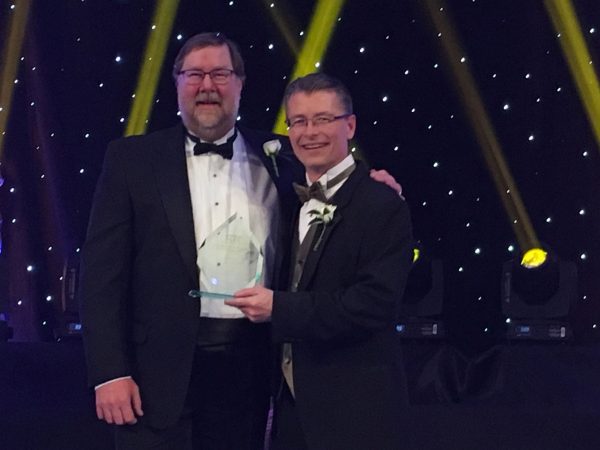 TOM HACK, CONSTRUCTION MANAGER, CITY OF ROCHESTER JIM HOFMANN, PRINICPAL WITH STANTECACCEPT A NATIONAL RECOGNITION AWARD AT THE AMERICAN COUNCIL OF ENGINEERING COMPANIES GALA IN WASHINGTON, DC.