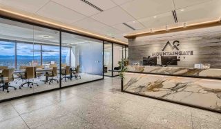Stantec customizes modern mountain aesthetic for Mountaingate Capital Office in 17th Street Plaza