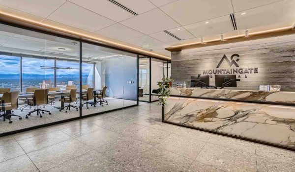 Lobby with reception desk and glass-walled meeting room