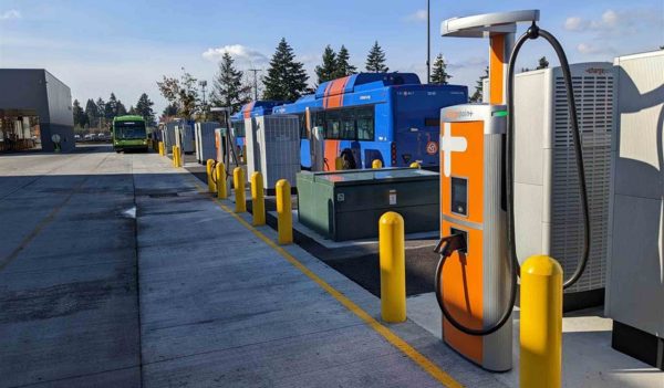 Electric bus charging stations at bus maintenance facility.
