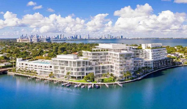 View of the residence complex on the water with Miami in the background