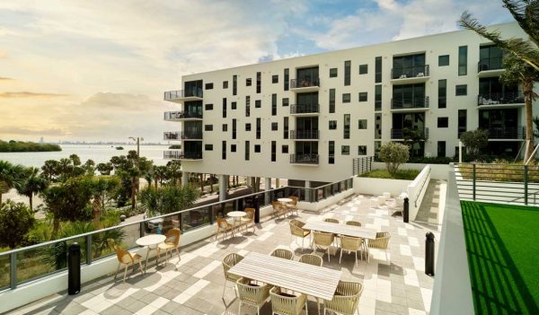 Rendering of new apartment complex with outdoor terrace for groups