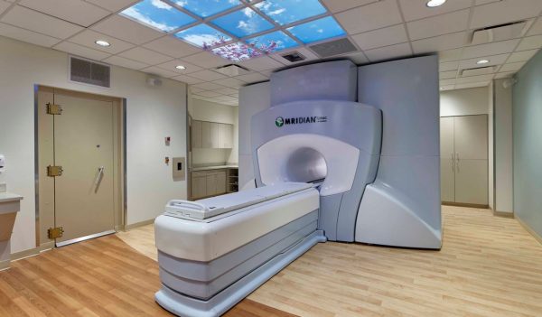 MRI Equipment in a hospital exam room. 
