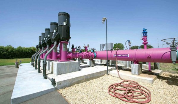 Pumping station with purple reclaimed water pipes.