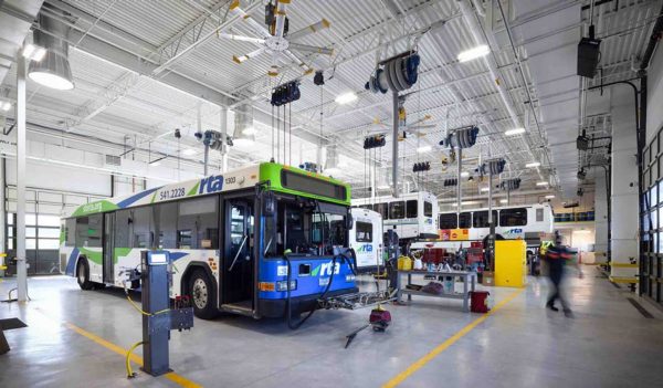 Interior of maintenance facility showing the bus repair bay area.