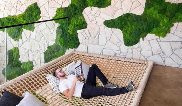 Man relaxing on a hammock.