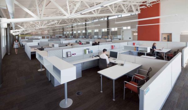 Open concept office space with workspaces.