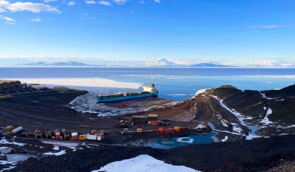 View of the AIMS project constructiom from above, with the Antarctic ocean in the background.
