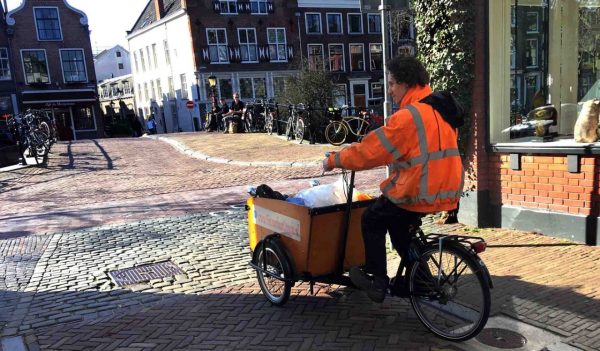 Worker on cargo bike in Utrecht