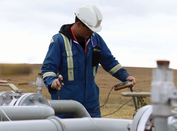 Man checking the integrity of a pipeline